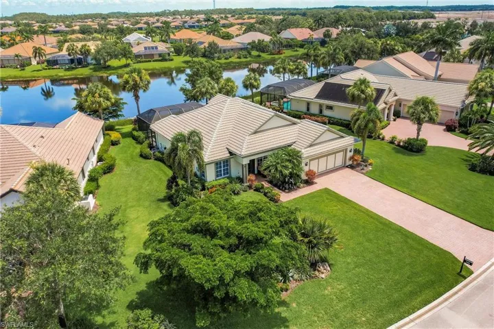 Aerial view of residential area with a nearby body of water