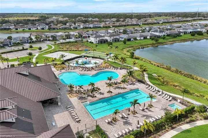 Aerial perspective of clubhouse area with two pool areas