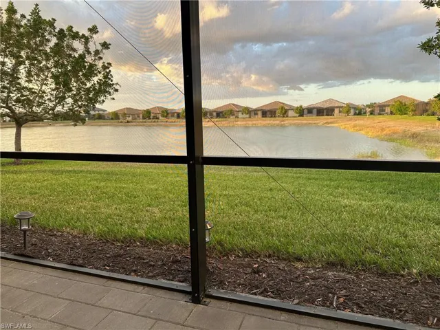 Peaceful view of the lake from the screened in Lanai