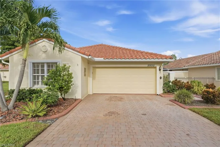 Tiled roof with stucco exterior