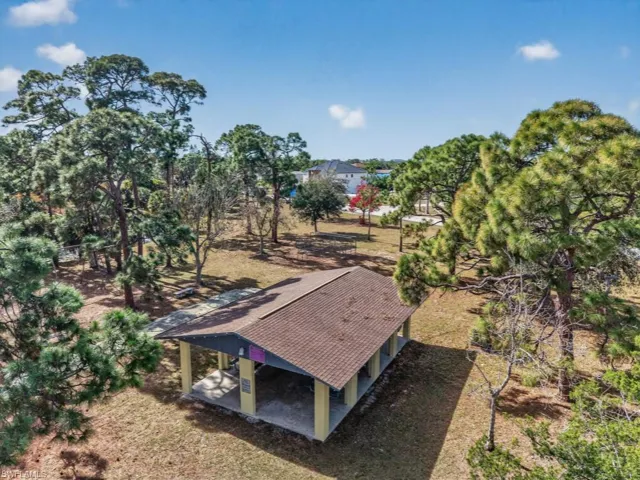 Community park with picnic tables and grills for community events