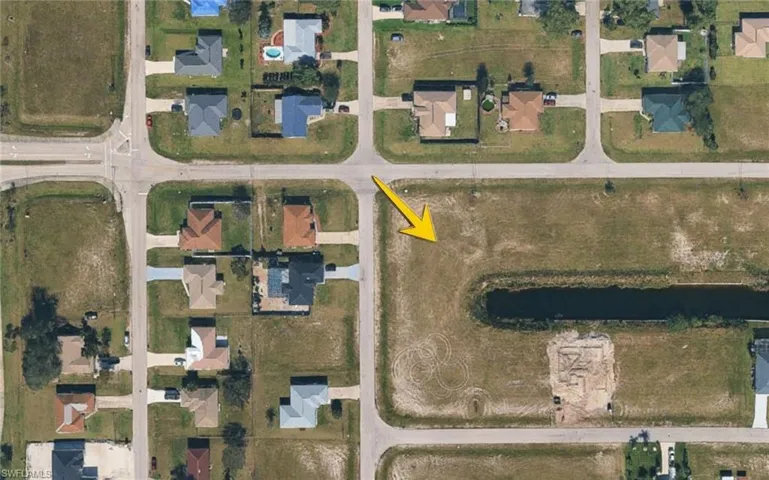 Aerial overview of property's location with nearby suburban area
