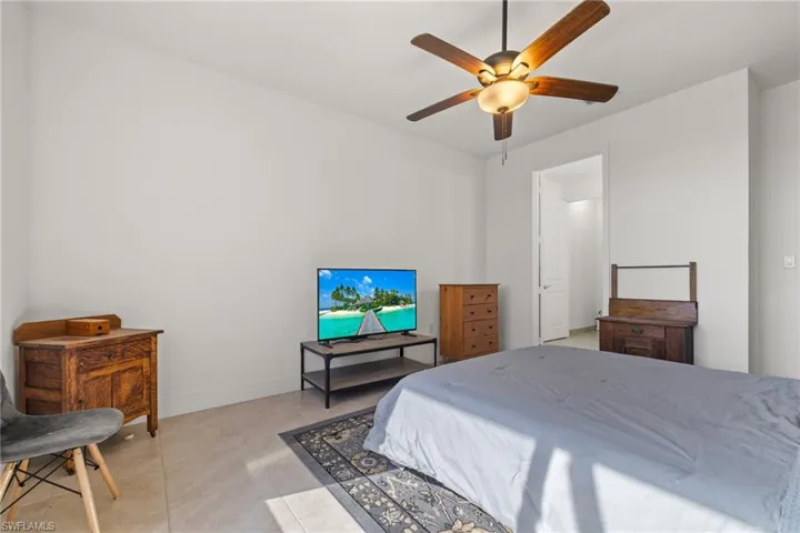 Bedroom featuring ceiling fan