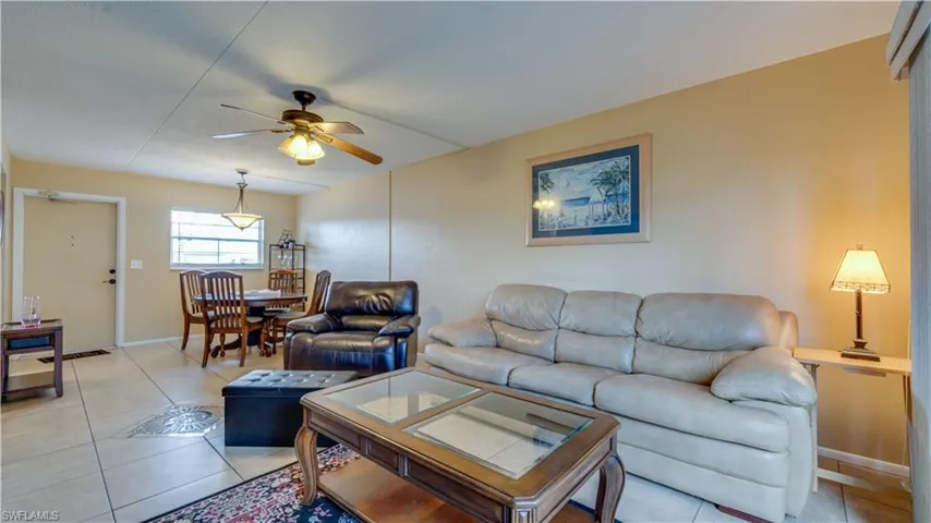 Tiled living room with ceiling fan