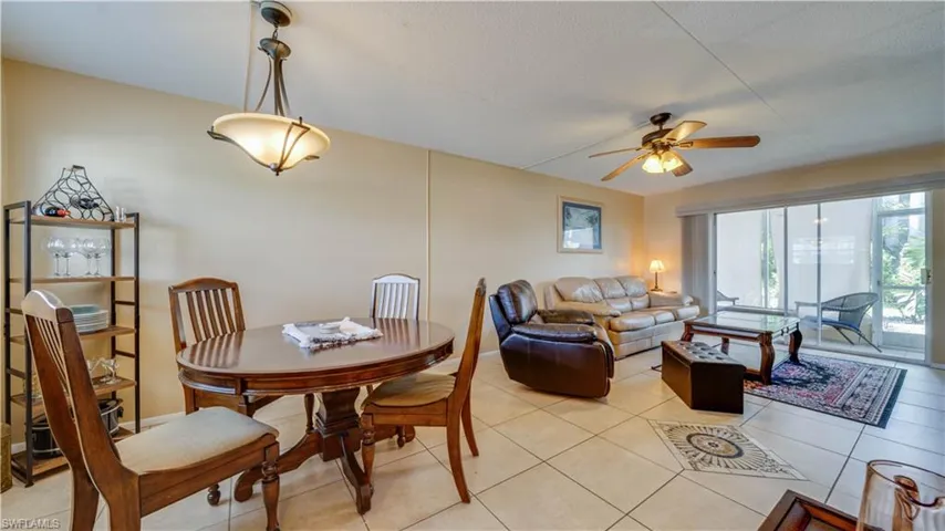 Tiled dining area with ceiling fan