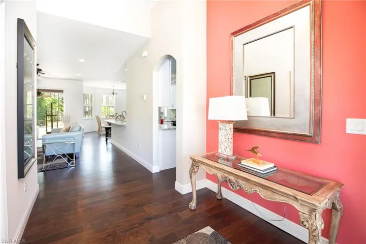 Entrance with dark hardwood floors