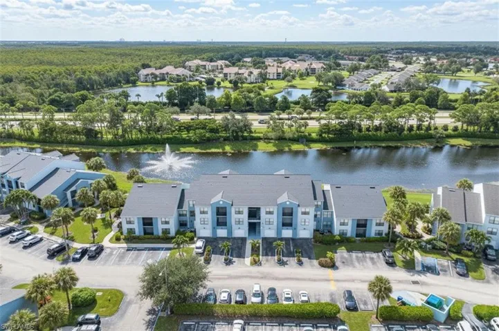 Aerial perspective of suburban area with a large body of water