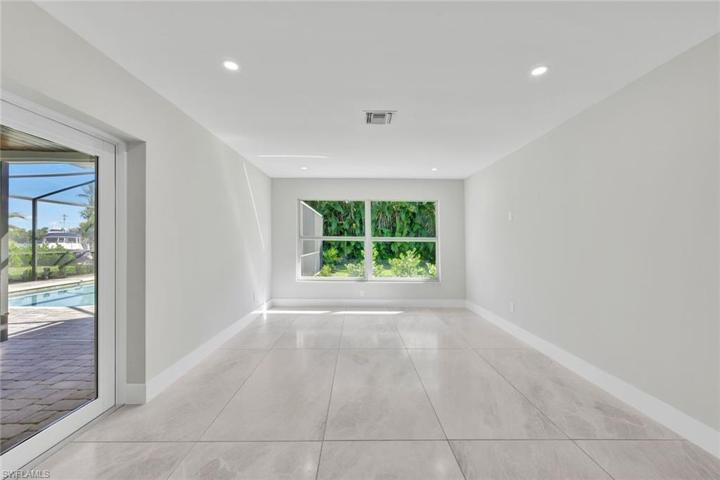 Dining room offers access to lanai.  Notice the natural light in every room!