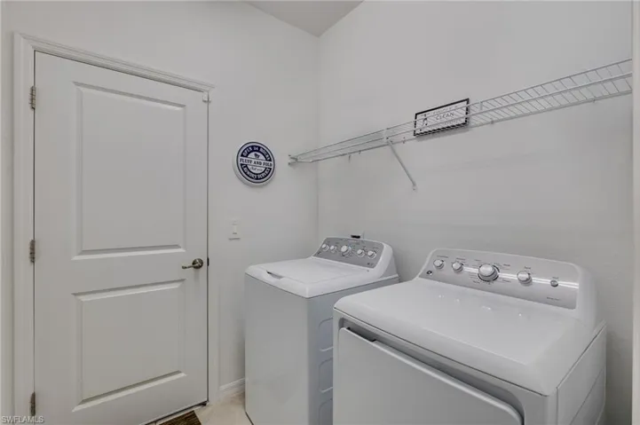 Laundry area featuring washing machine and dryer