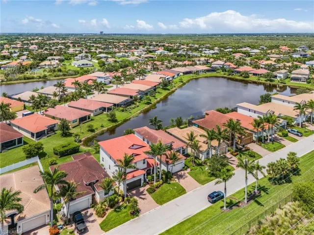 Aerial view of residential area with a nearby body of water