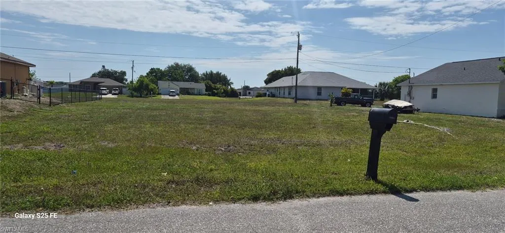 Expansive, level lot with grass coverage