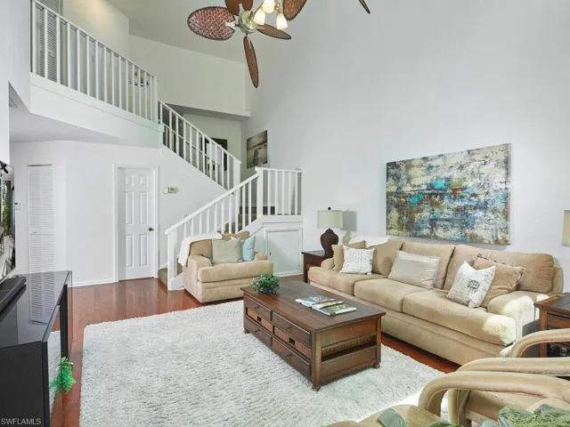 This room is open to dining area, with kitchen just around the corner.