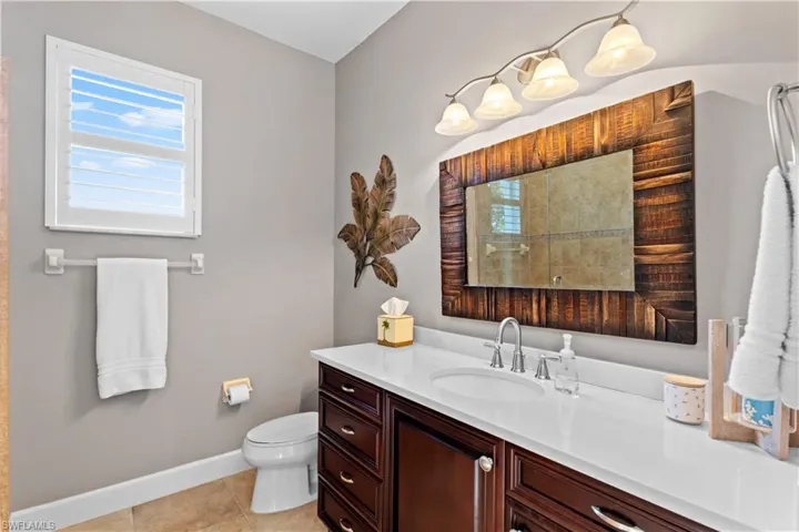 Bathroom featuring vanity and light tile patterned flooring