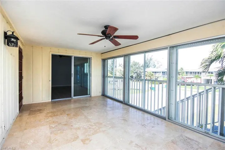 Spare room with ceiling fan