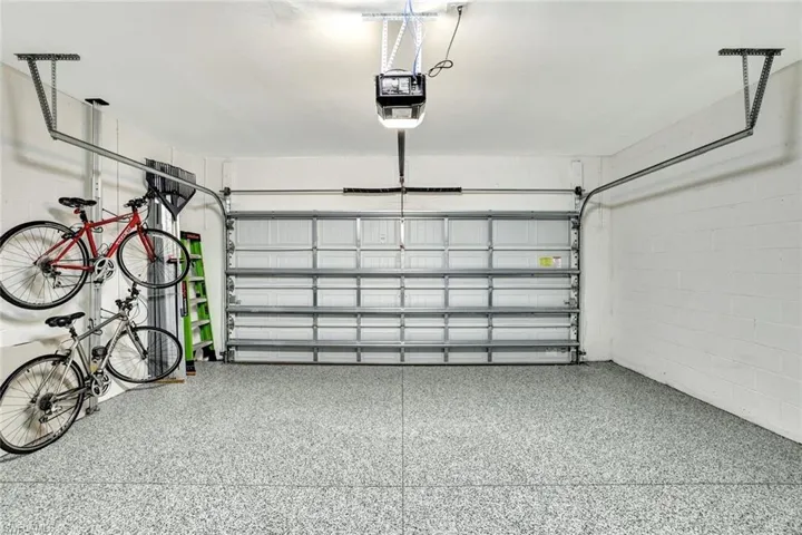 Two car Garage featuring epoxy flooring