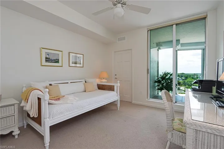 Bedroom featuring carpet floors and ceiling fan