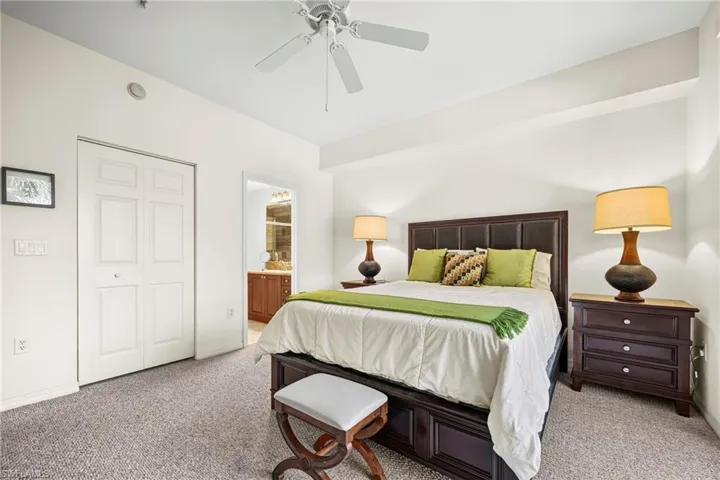 Bedroom featuring neutral-toned carpeting and light-colored walls