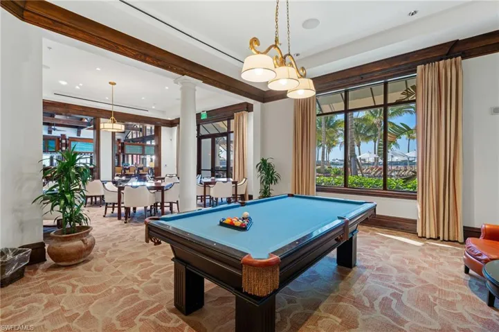 Recreation room with pool table, recessed lighting, and plenty of natural light