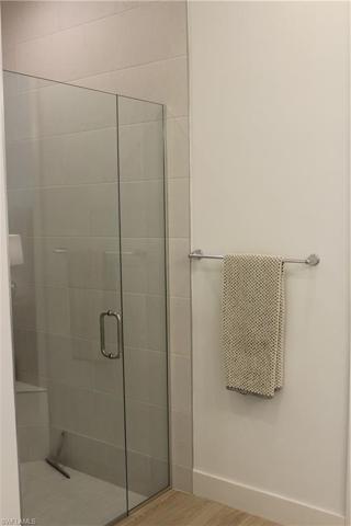Walk in shower with glass doors