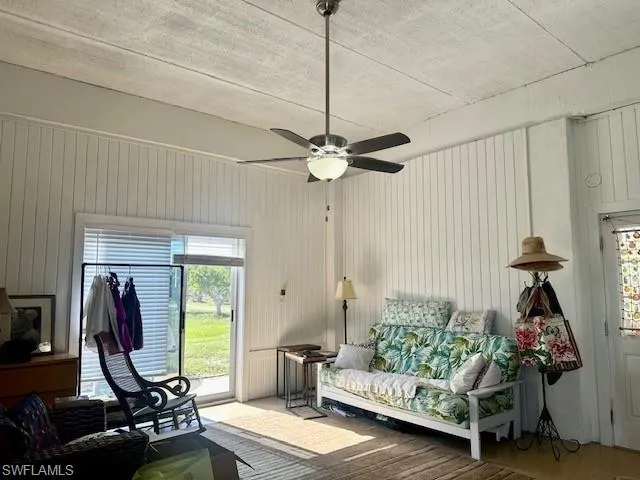 Living room featuring ceiling fan