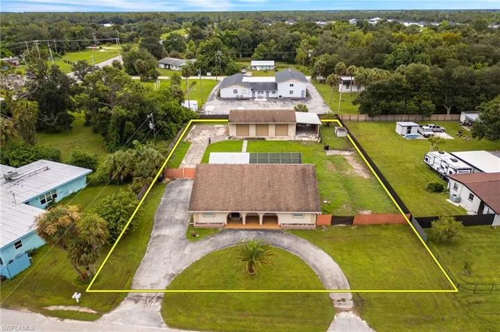 Aerial view of property's location featuring property parcel outlined