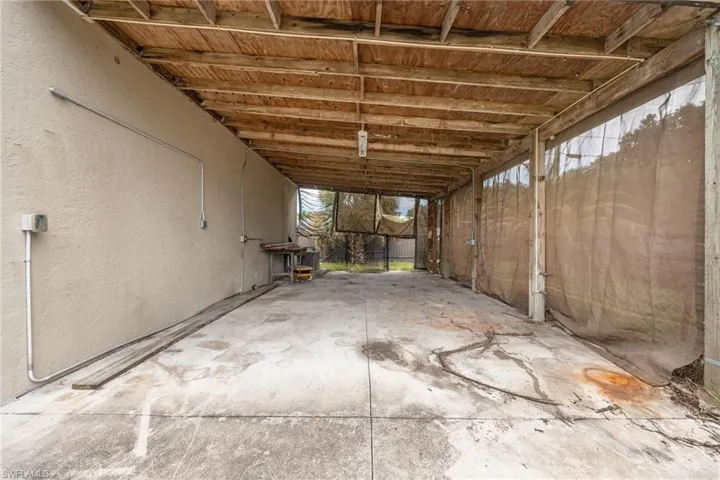 Carport on side of detached garage