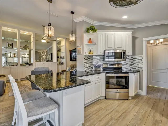 Granite counters and stainless steel appliances.
