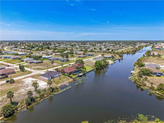 Aerial perspective from the canal intersection with views of the neighborhood