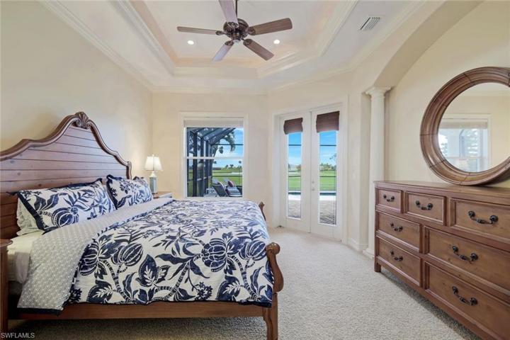 Lots of architectural detail in the primary bedroom, tray ceilings, crown molding
