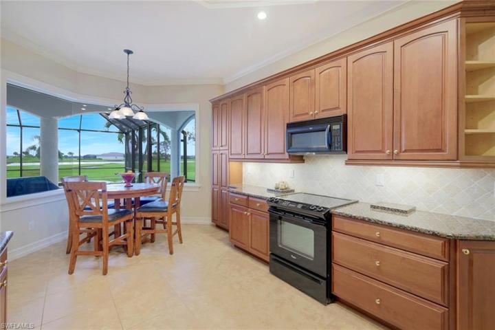 Enjoy views of the pool and golf course from the kitchen