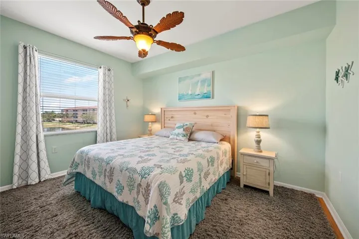 Master bedroom w/large window for daylight and fresh air