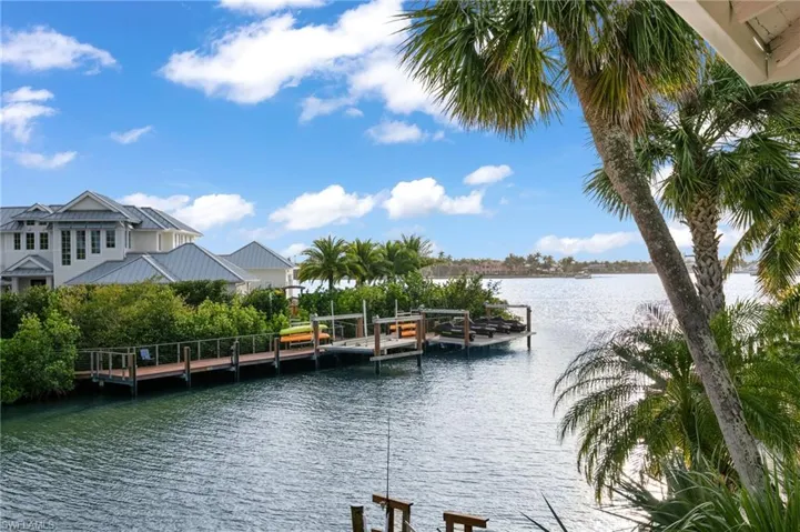 View of water feature with a boat dock