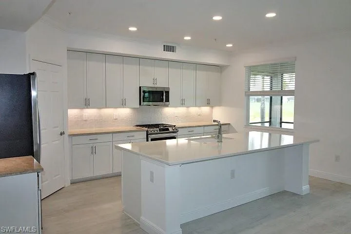 Quartz countertops w/additional complimenting counter tops.