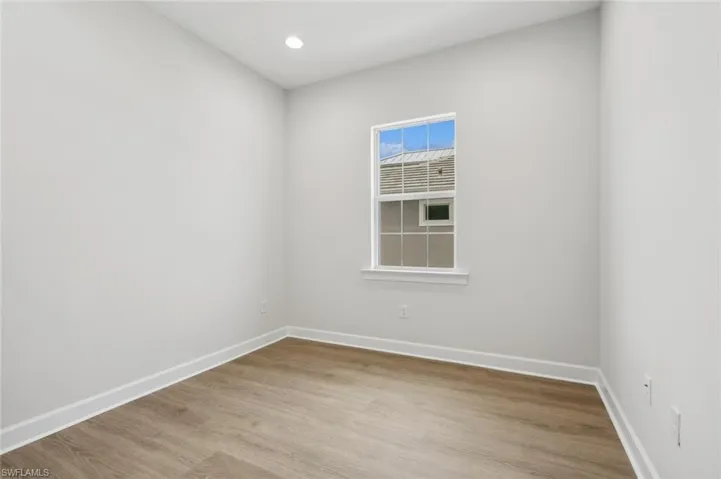 Spare room with light hardwood / wood-style floors