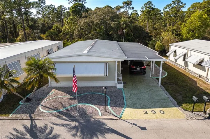 View of front of house featuring a carport