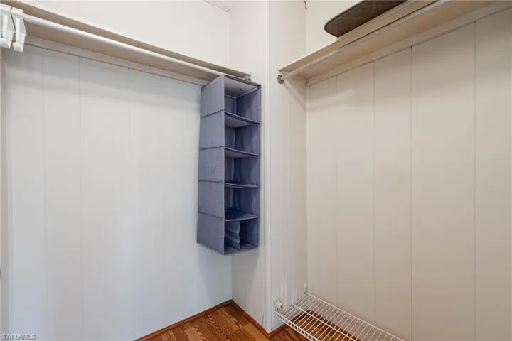 Spacious closet featuring wood finished floors