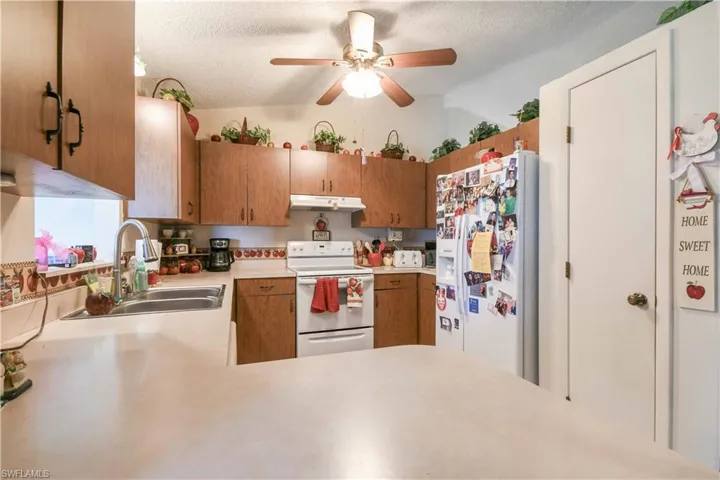 Kitchen with white appliances