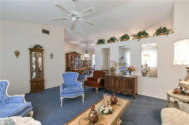 Living area with carpet floors