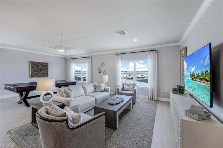 Second floor living area, which consist of bedroom, ensuite bathroom, living room area and bonus room