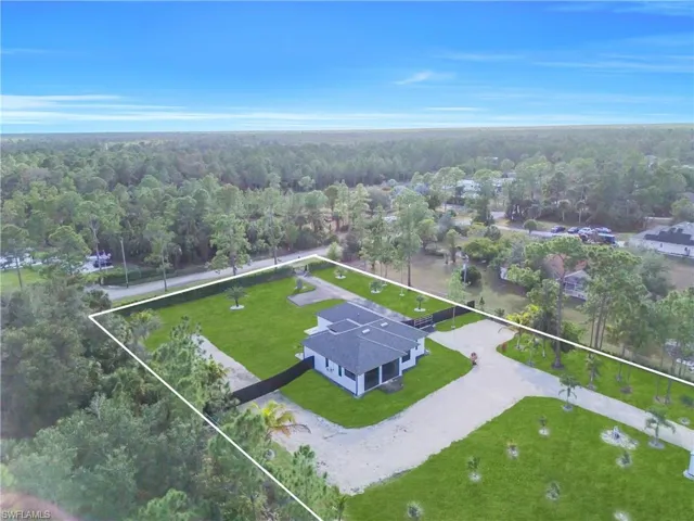 Aerial overview of property's location with property parcel outlined