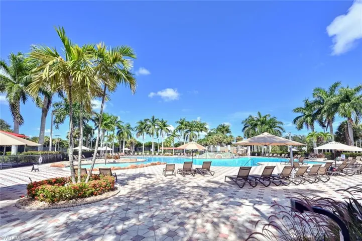 Community pool with a patio area