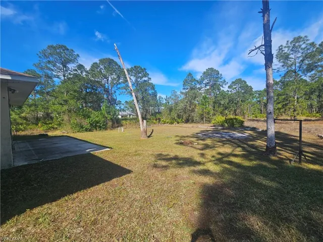 View of yard with a patio