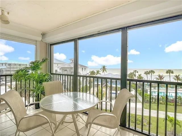South corner Balcony with a Gulf view and tile floors