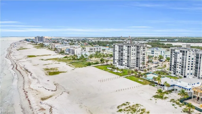 View of urban area with expansive beach