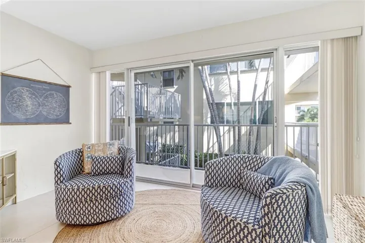 Sitting room featuring tile patterned floors