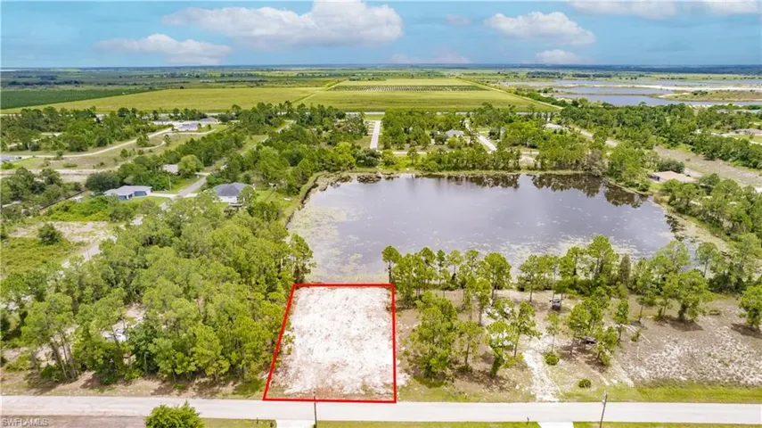 View of property location featuring property parcel outlined and a nearby body of water