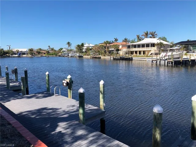 Dock area featuring a canal view