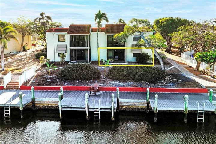 Back of house featuring a wcanal view