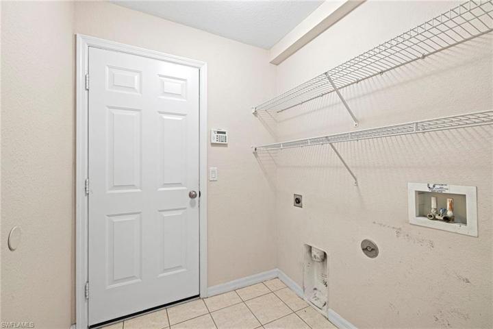 Laundry room INSIDE home great especially during warm summer months!