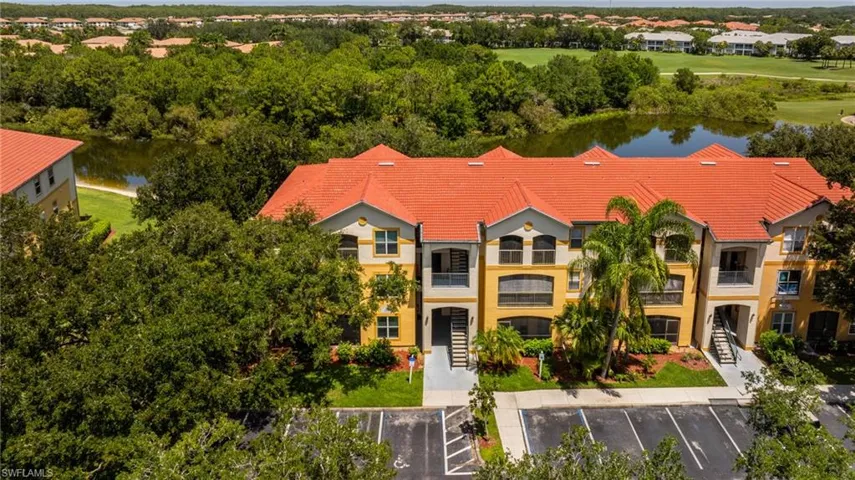 Aerial view of Royal Greens buildings and tropical landscaping